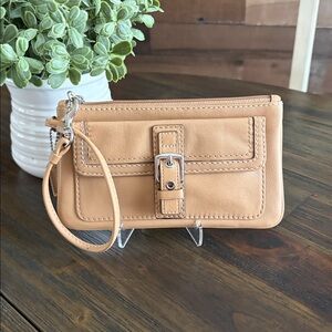 Coach Vintage Soho Leather wristlet clutch.